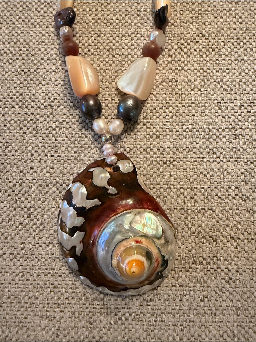 Handcrafted Brown Shell Pendant Necklace with Mother-of-Pearl Accents